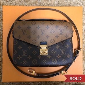 SOLD - Louis Vuitton pochette Métis reverse